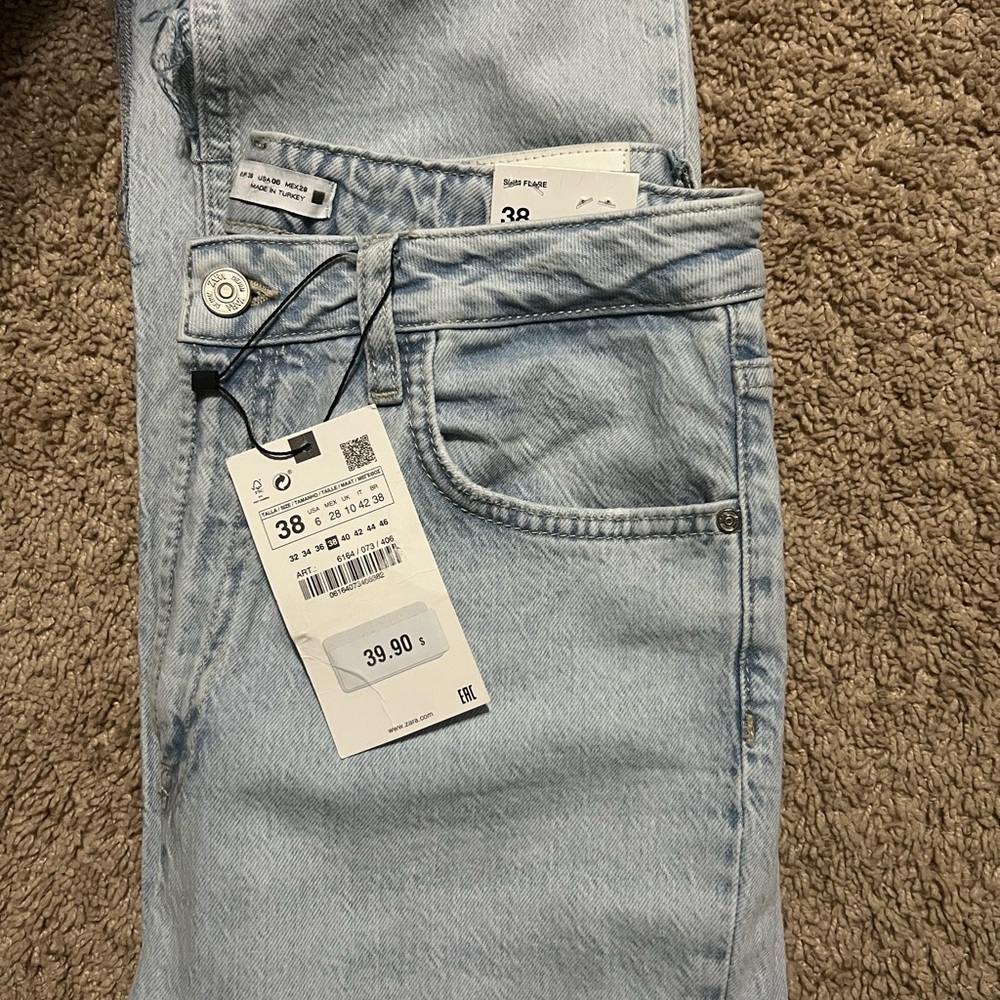 Ripped light wash high waisted Zara jeans
